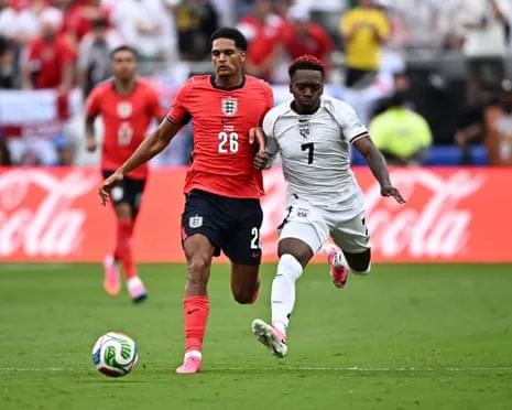 Jarell Quansah in action with Colombia's Luis Diaz as the second half gets under way in New Jersey.