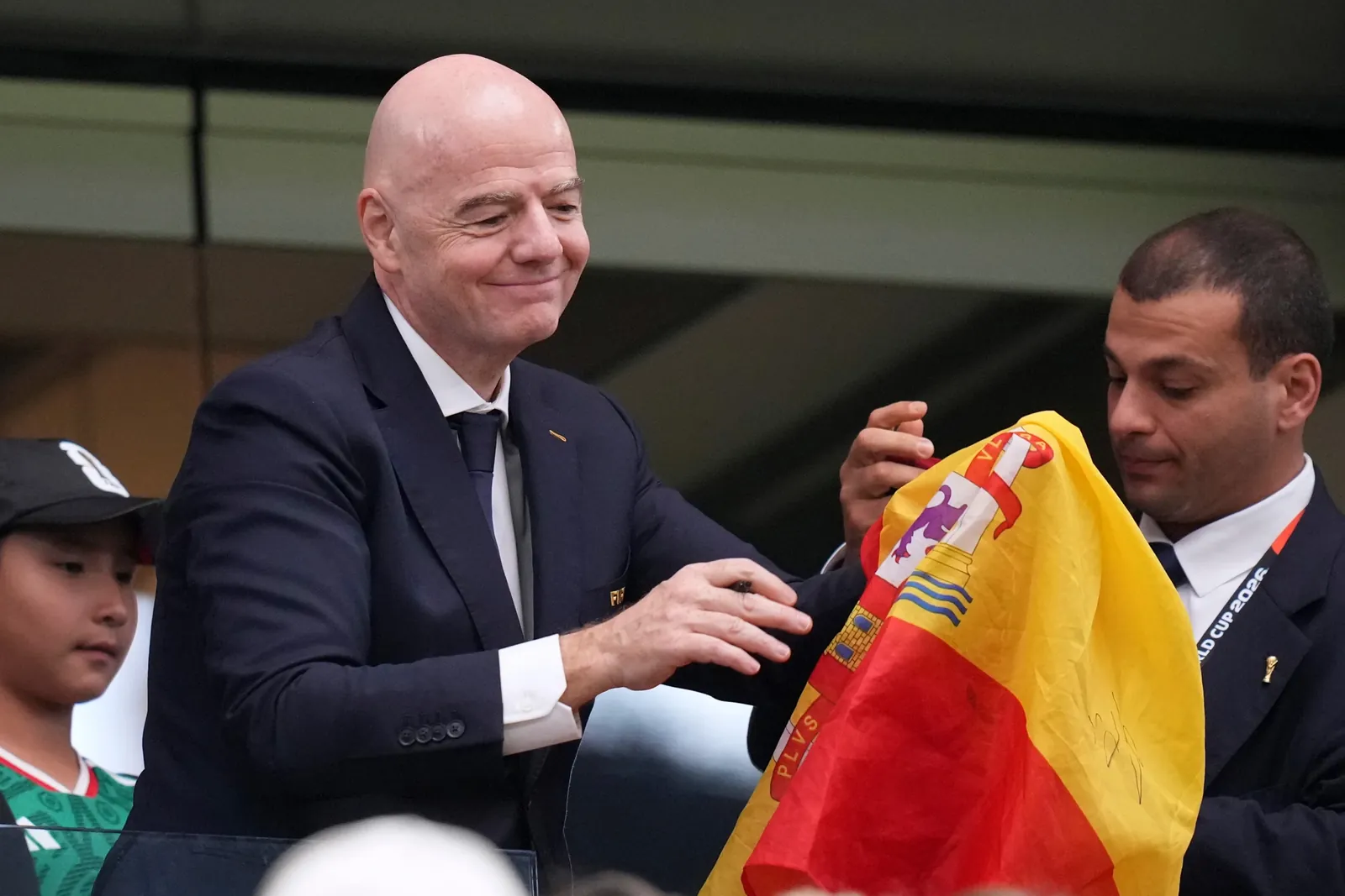 FIFA president Gianni Infantino signs autographs after Spain defeated France the World Cup semifinal soccer match in Arlington, Texas, near Dallas, Tuesday, July 14, 2026. (AP Photo/Eric Gay)