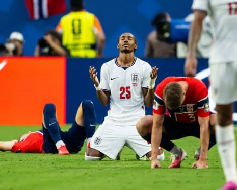 Djed Spence celebrates as Norway players slump