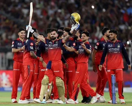 Royal Challengers Bengaluru's Virat Kohli and teammates celebrate their IPL triumph